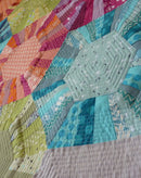 Hexa-scrappy quilt