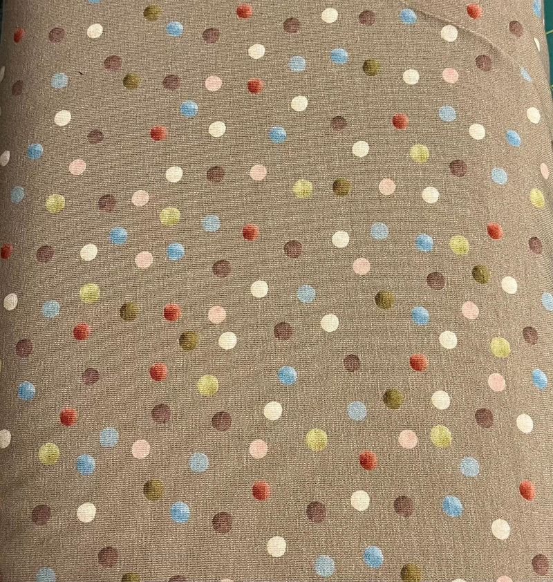 Dots på beige Jersey 1m bit